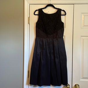 Black mid length formal dress. Size 10. NWOT. See tag for material.